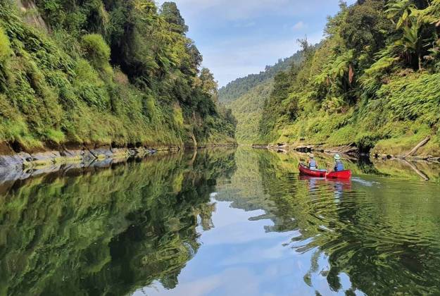 two paddlers in the Whanganui gorge
